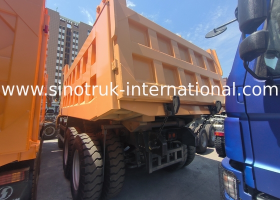 Sinotruk Howo Madencilik Çekmeci Çöp Kamyonu 90 Ton 6 × 4 Yüksek Güçlü Çelik Kargo Vücudu