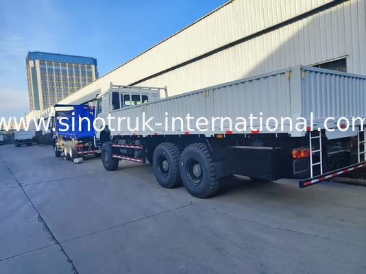Gücü ve çok yönlülüğünü serbest bırakın. Hepsini fethetmek için beyaz HOWO 6x6 400HP Off Road Kargo Kamyonu.
