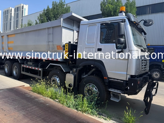 SINOTRUK HOWO 371HP 8X4 Tipper Dump Truck Construction Old Front Face Military Bumper For Mining Areas Two Warning Lights U Type Container